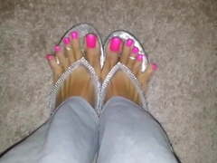 Sexy toe spread in flip flop and bright pink pedi